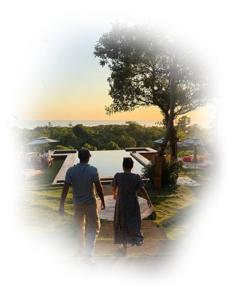 Aabhas and Marianne walking together at sunset in the Philippines